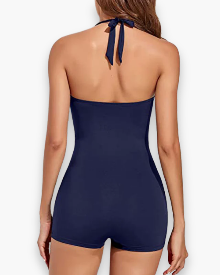 Elegancki damski jednoczęściowy strój kąpielowy o nowoczesnym kroju, w żywym kolorze, wykonany z trwałego materiału, idealny na plażę i basen.