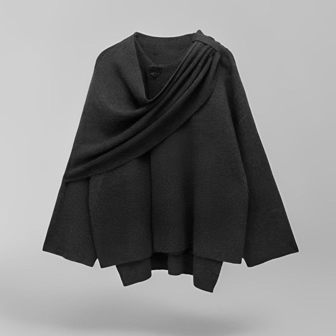 Damski elegancki jesienny płaszcz-peleryna, asymetryczny design w kolorze szarym, miękki materiał, nowoczesny i wygodny styl na chłodne dni.