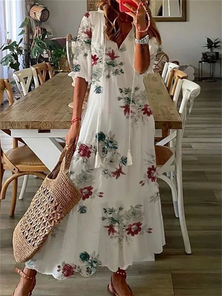 Maxi robe d'été aérée taille plus, longue et élégante avec manches courtes, chic pour les journées chaudes.