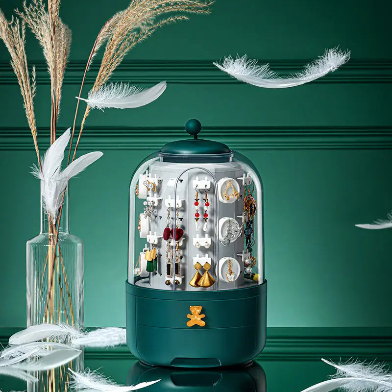 Obrotowy organizer na biżuterię w kolorze zielonym z 5 szufladami, kompaktowym, nowoczesnym designem, obracany o 360° dla pełnego podglądu.
