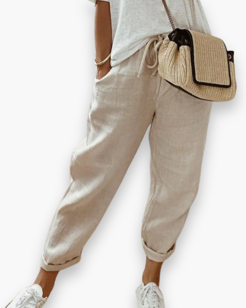 Szerokie spodnie damskie, lekka tkanina, nowoczesny styl, dyskretne kieszenie, elastyczny pas, elegancki krój, optymalny komfort