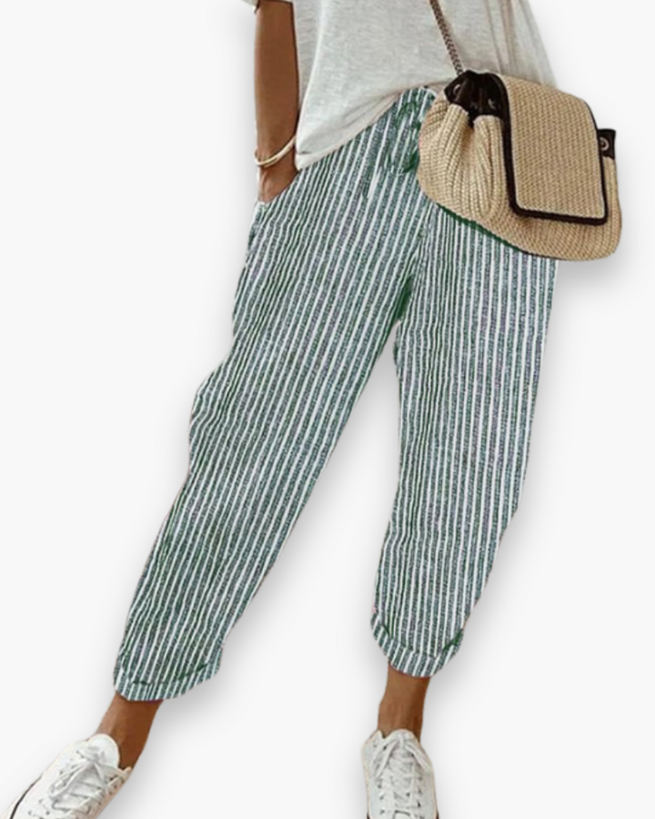 Szerokie spodnie damskie, lekka tkanina, nowoczesny styl, dyskretne kieszenie, elastyczny pas, elegancki krój, optymalny komfort