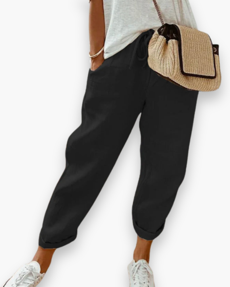 Szerokie spodnie damskie, lekka tkanina, nowoczesny styl, dyskretne kieszenie, elastyczny pas, elegancki krój, optymalny komfort