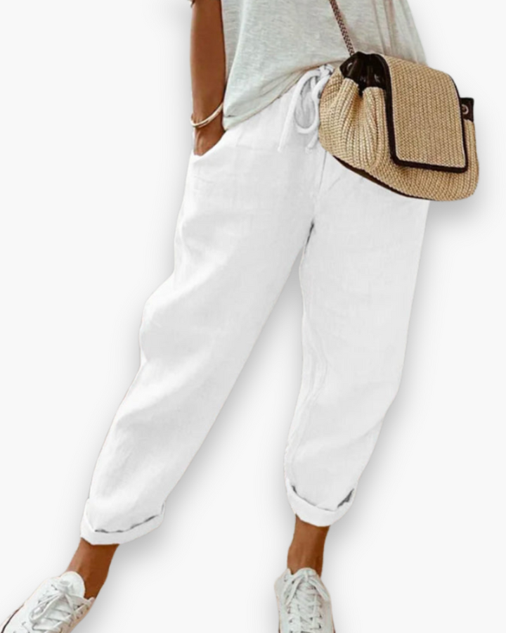 Szerokie spodnie damskie, lekka tkanina, nowoczesny styl, dyskretne kieszenie, elastyczny pas, elegancki krój, optymalny komfort