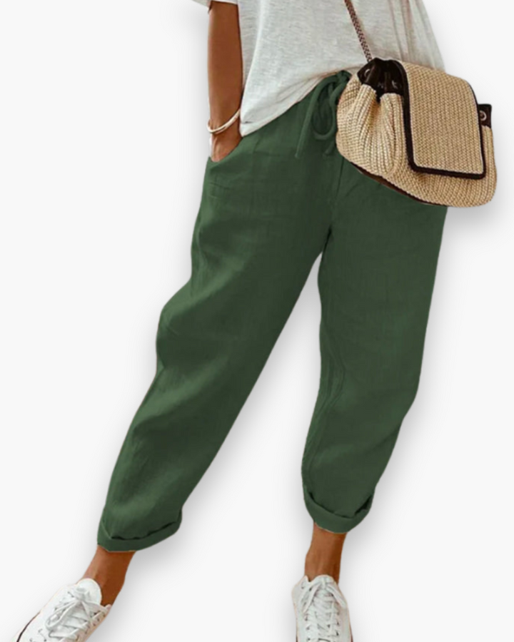 Szerokie spodnie damskie, lekka tkanina, nowoczesny styl, dyskretne kieszenie, elastyczny pas, elegancki krój, optymalny komfort