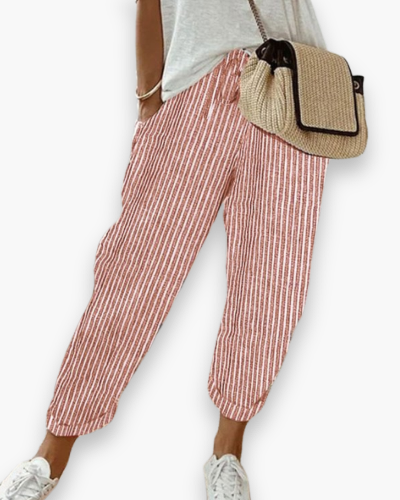 Szerokie spodnie damskie, lekka tkanina, nowoczesny styl, dyskretne kieszenie, elastyczny pas, elegancki krój, optymalny komfort