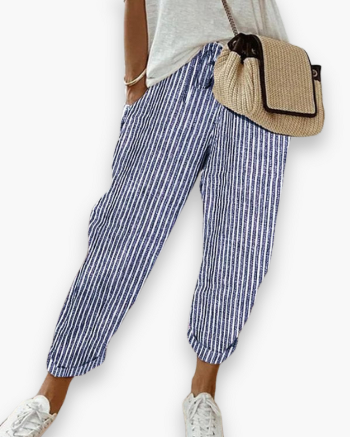 Szerokie spodnie damskie, lekka tkanina, nowoczesny styl, dyskretne kieszenie, elastyczny pas, elegancki krój, optymalny komfort