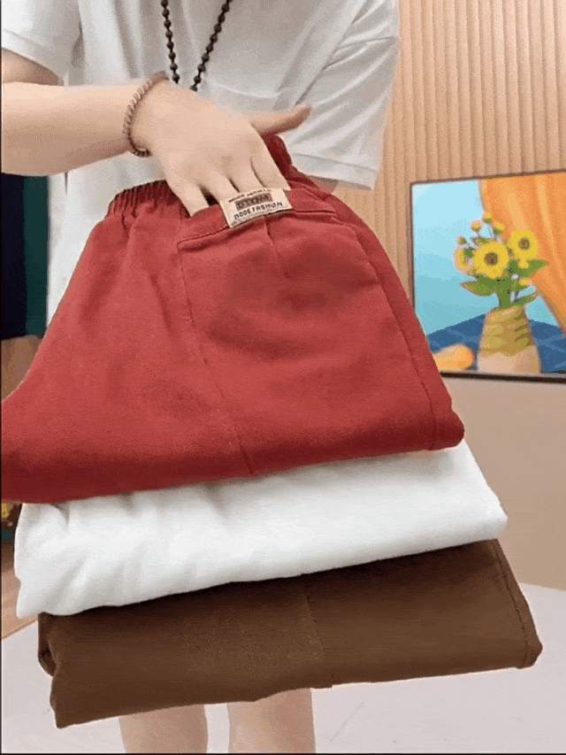 Nowoczesne bawełniane spodnie damskie, z elastycznym dopasowaniem, dostępne w kolorach beżowym, czarnym i khaki, eleganckie i wszechstronne.