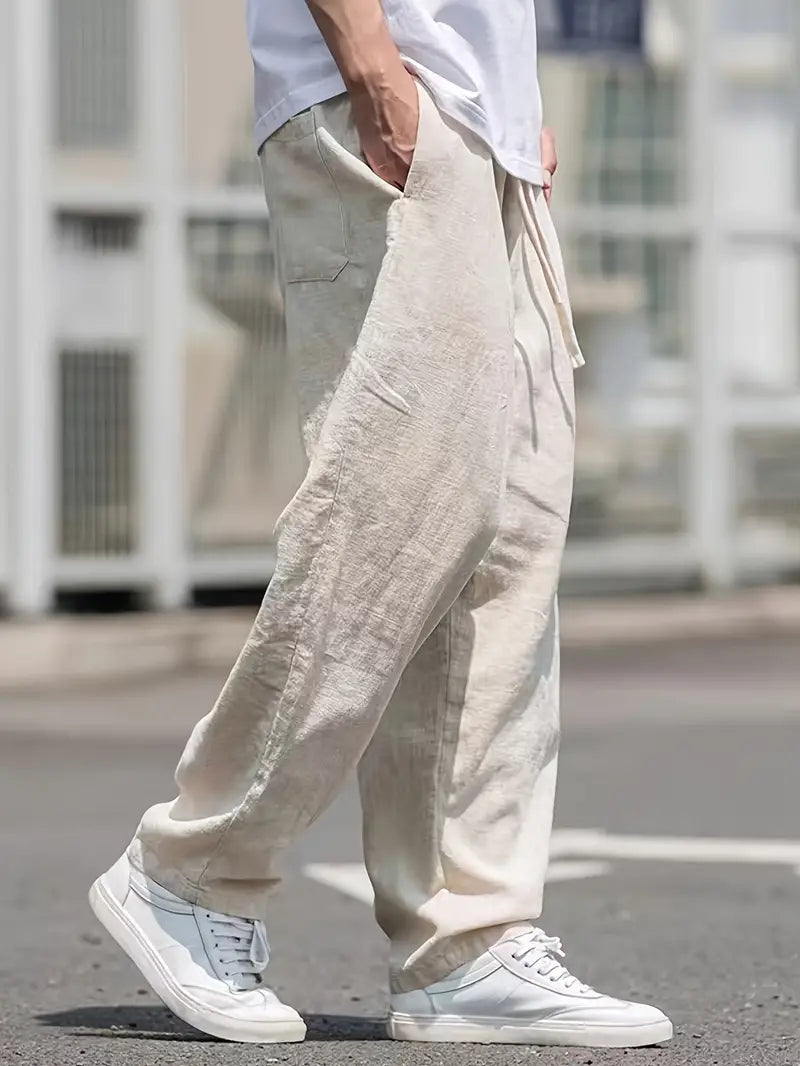 Męskie lniane spodnie typu wide leg, lekkie, oddychające, nowoczesny design zapewniający letni komfort, elegancki styl casualowy