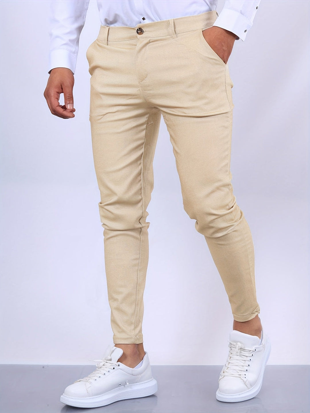 Eleganckie męskie spodnie slim fit, nowoczesny i dopasowany krój, idealne do profesjonalnego wyglądu i komfortu.