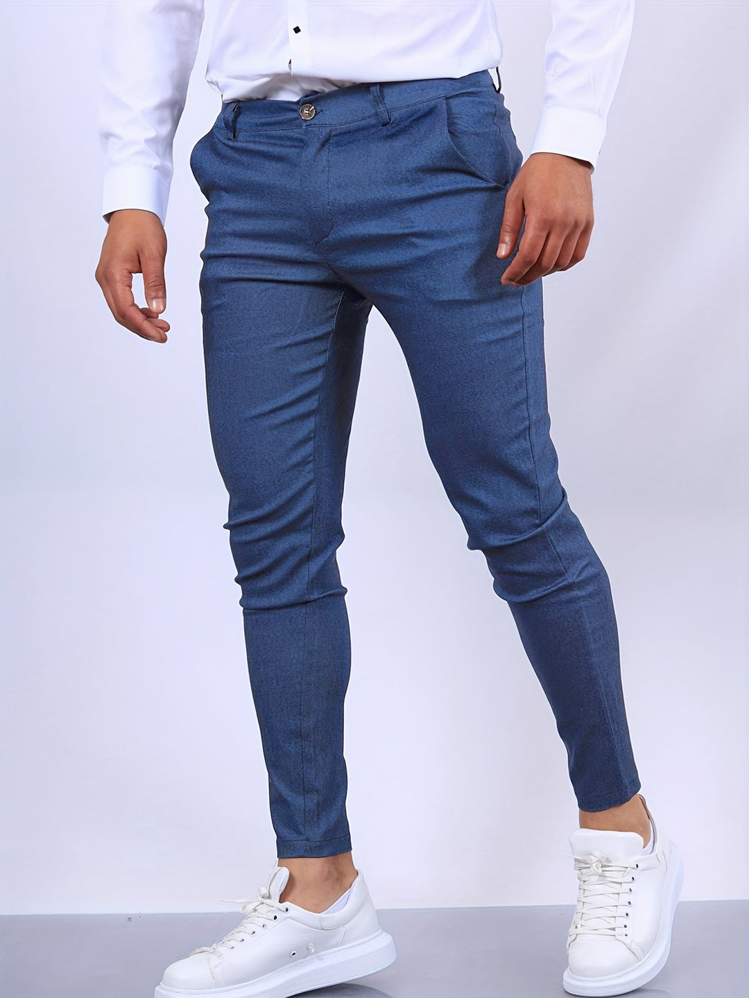 Eleganckie męskie spodnie slim fit, nowoczesny i dopasowany krój, idealne do profesjonalnego wyglądu i komfortu.