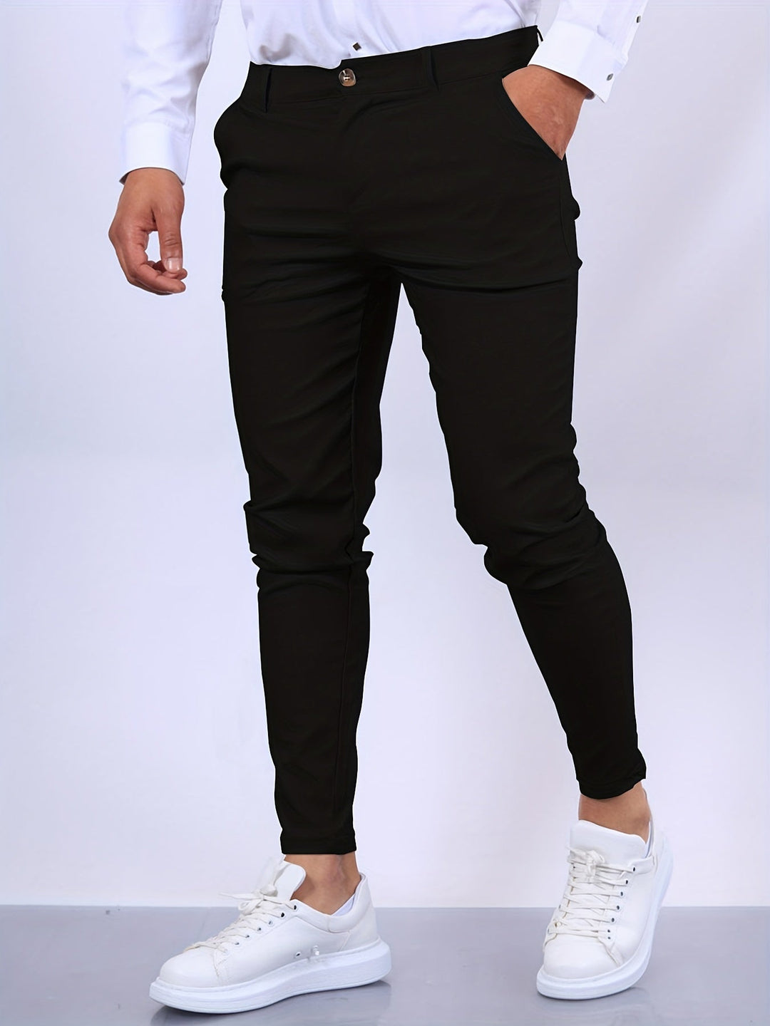 Eleganckie męskie spodnie slim fit, nowoczesny i dopasowany krój, idealne do profesjonalnego wyglądu i komfortu.