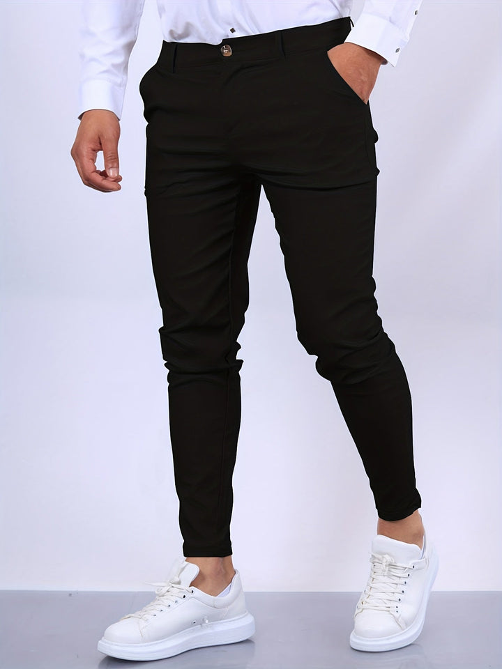 Eleganckie męskie spodnie slim fit, nowoczesny i dopasowany krój, idealne do profesjonalnego wyglądu i komfortu.