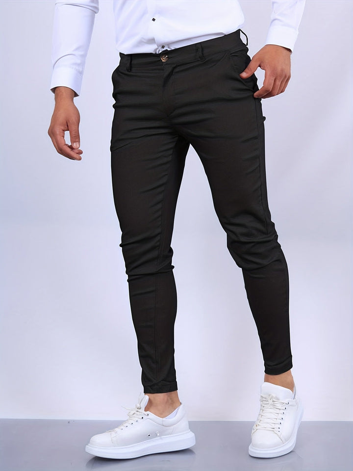 Eleganckie męskie spodnie slim fit, nowoczesny i dopasowany krój, idealne do profesjonalnego wyglądu i komfortu.