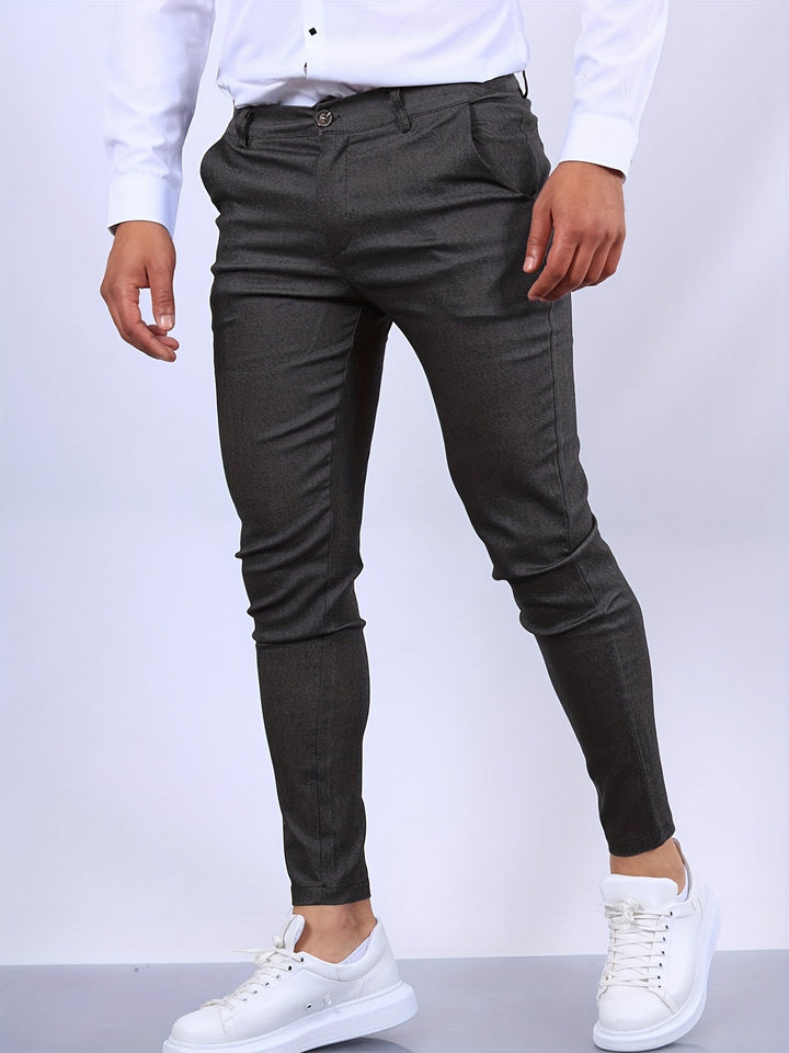 Eleganckie męskie spodnie slim fit, nowoczesny i dopasowany krój, idealne do profesjonalnego wyglądu i komfortu.