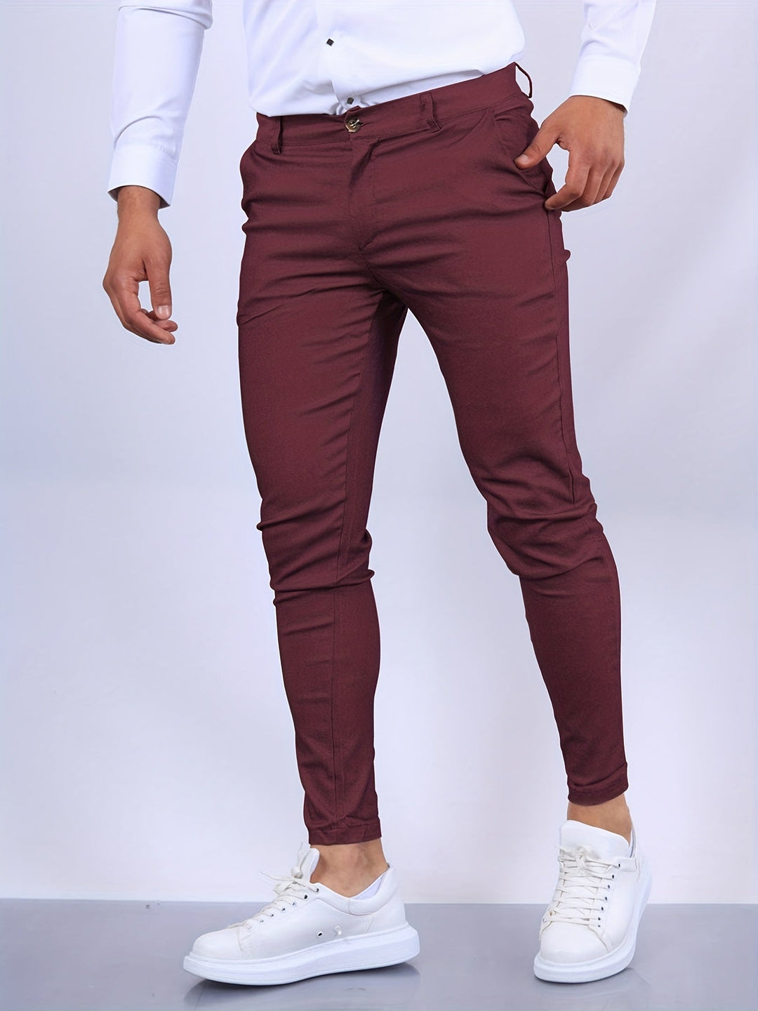 Eleganckie męskie spodnie slim fit, nowoczesny i dopasowany krój, idealne do profesjonalnego wyglądu i komfortu.