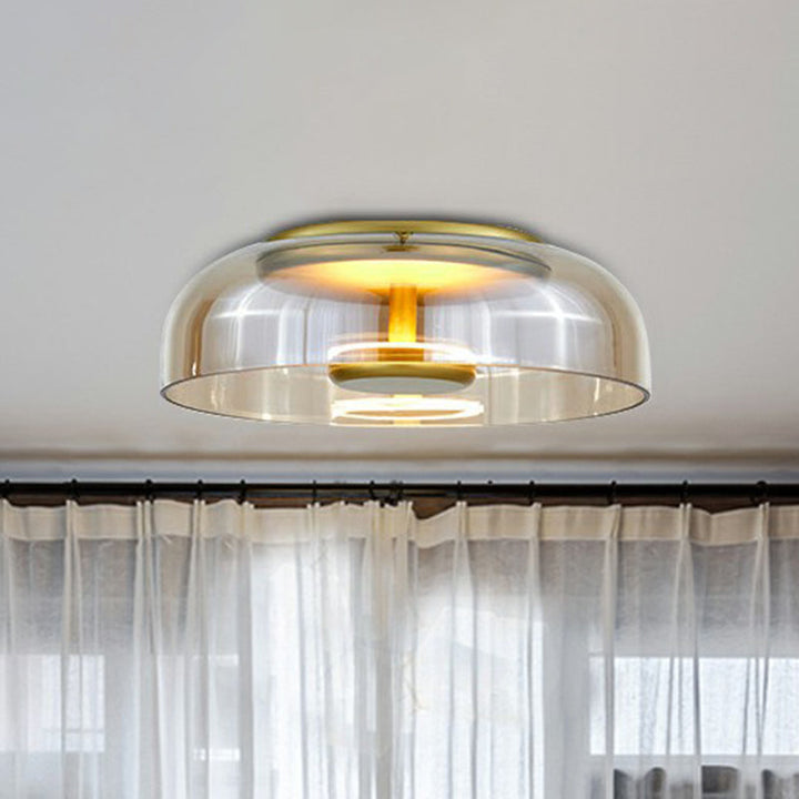 Nowoczesna lampa sufitowa LED ze szkła dymionego, elegancki kształt, ciepłe światło, idealna do przedpokoju lub salonu.