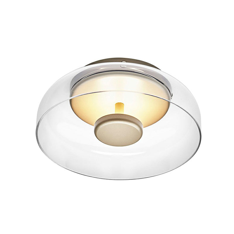 Nowoczesna lampa sufitowa LED ze szkła dymionego, elegancki kształt, ciepłe światło, idealna do przedpokoju lub salonu.