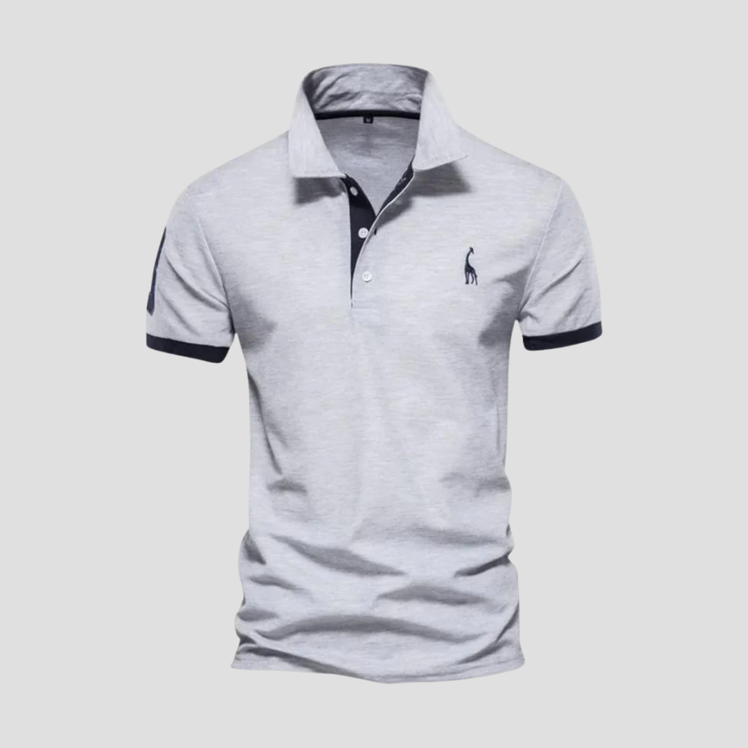 Klasyczna, wygodna koszulka polo męska w granatowym kolorze, prezentująca elegancki krój i wysoką jakość materiału.