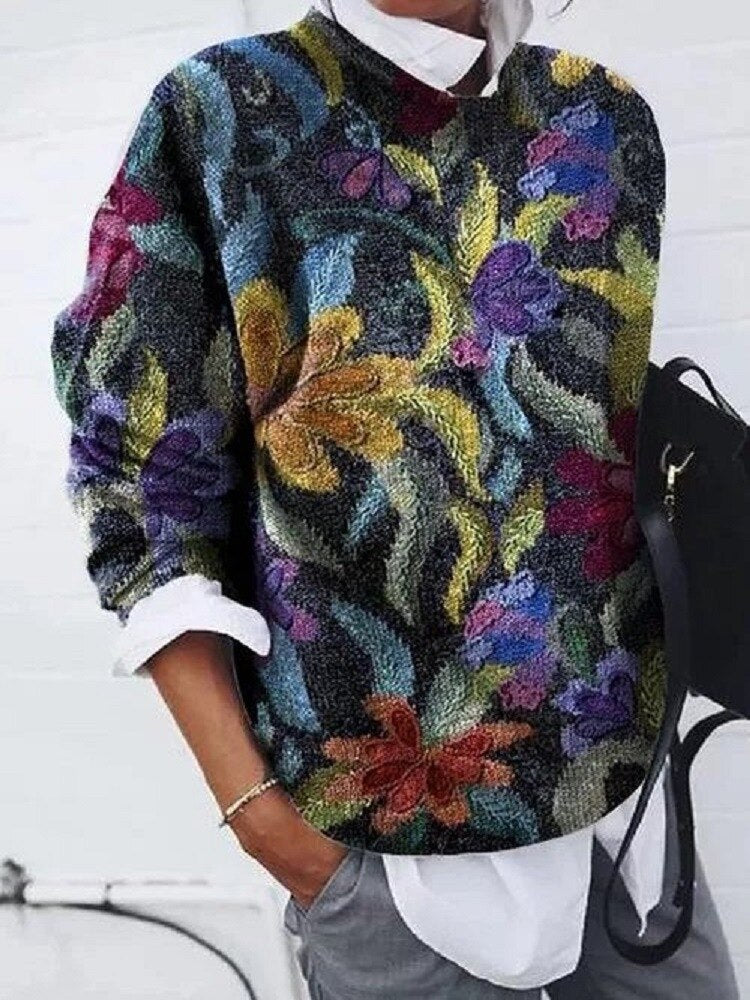 Elegancki sweter damski z delikatnym kwiatowym wzorem, wykonany z mieszanki bawełny, zapewniający komfortowy i pochlebny wygląd.