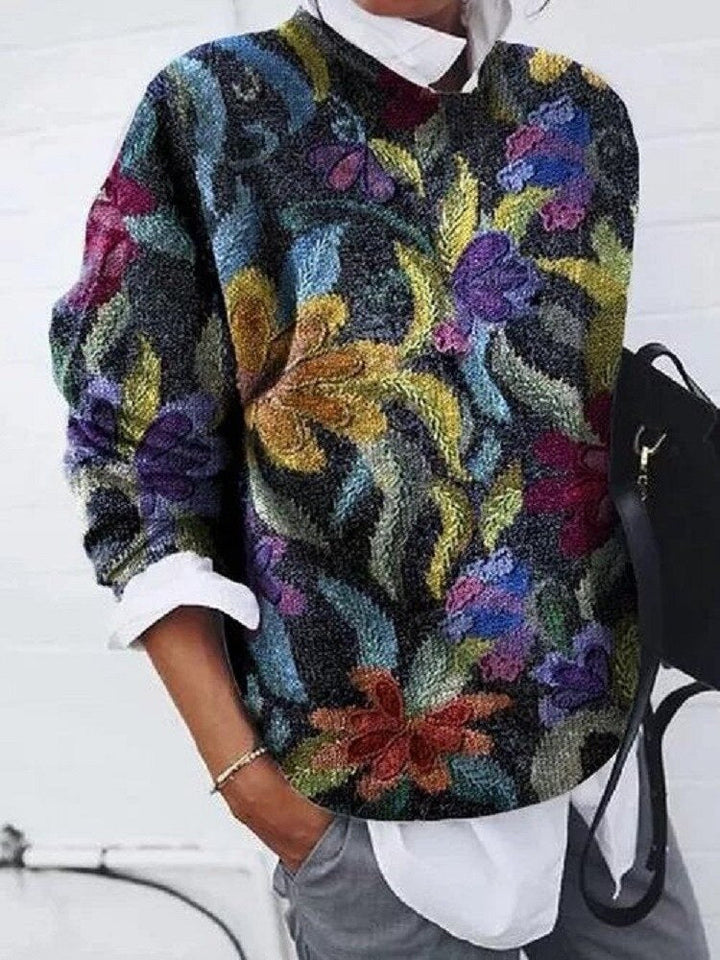 Elegancki sweter damski z delikatnym kwiatowym wzorem, wykonany z mieszanki bawełny, zapewniający komfortowy i pochlebny wygląd.