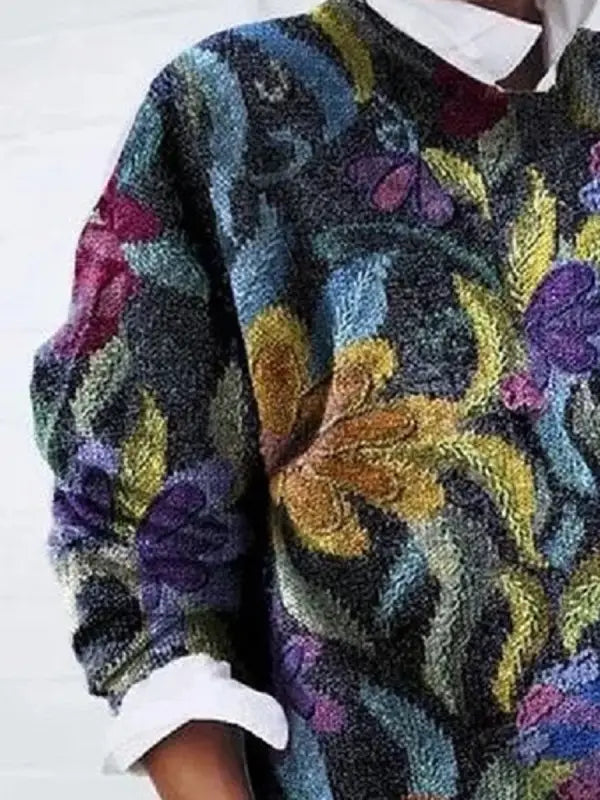 Elegancki sweter damski z delikatnym kwiatowym wzorem, wykonany z mieszanki bawełny, zapewniający komfortowy i pochlebny wygląd.