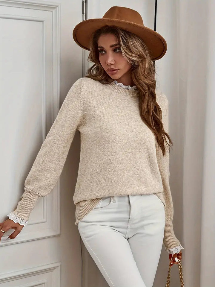 Elegancki sweter damski, okrągły dekolt, ozdobne rękawy, nowoczesny, szykowny i wygodny, idealny do pracy lub na co dzień.