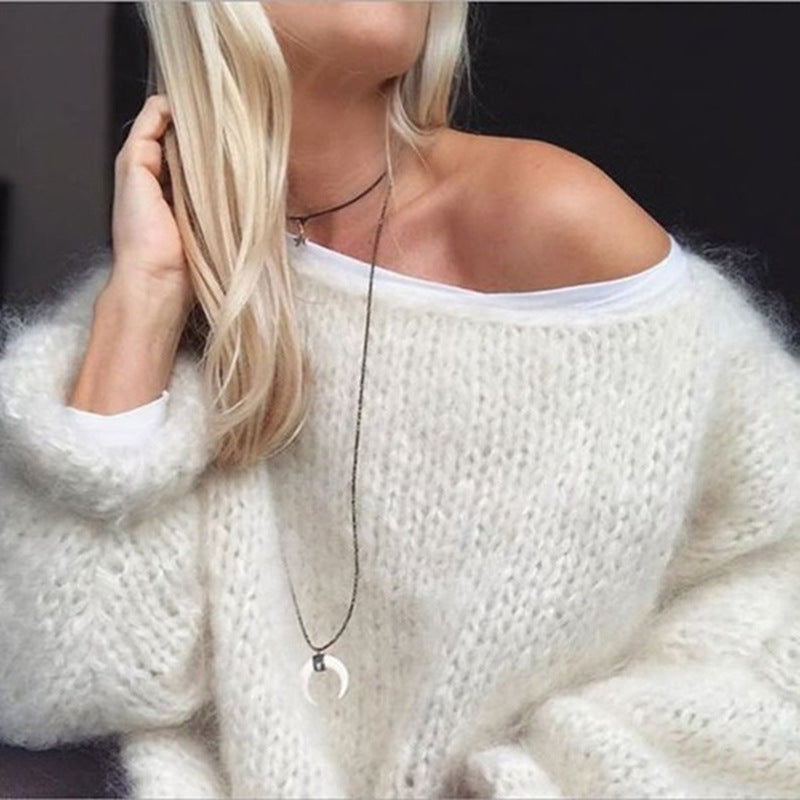Miękki sweter damski z dzianiny, okrągły dekolt, długie rękawy, dopasowany krój, modny kolor dla eleganckiego i wygodnego stylu.