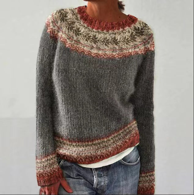 Kolorowy sweter damski z miękkiej dzianiny, długi rękaw, wygodny krój, wielokolorowy wzór, idealny na jesień-zimę.