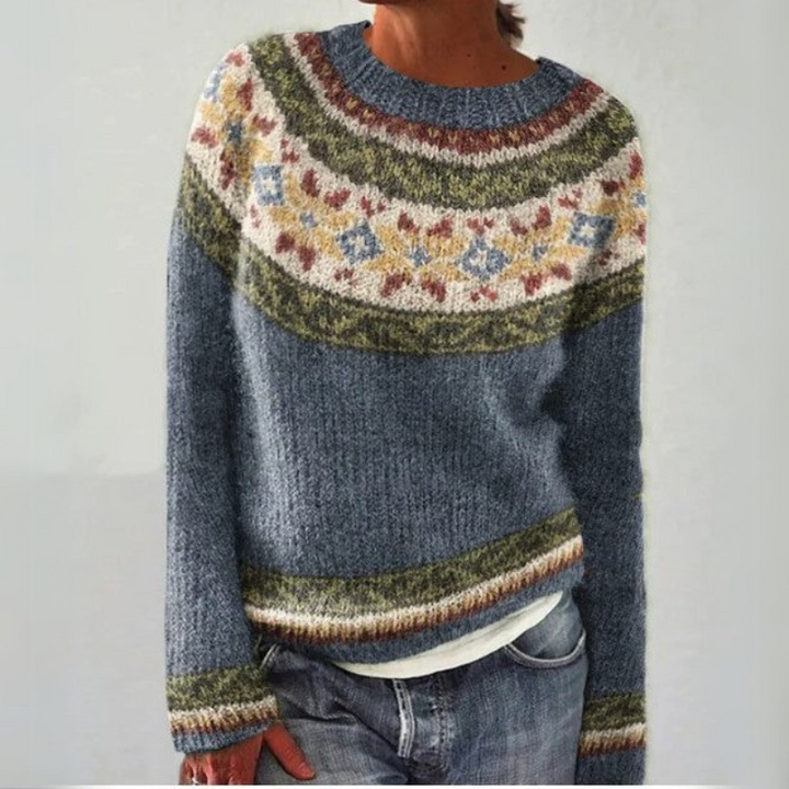 Kolorowy sweter damski z miękkiej dzianiny, długi rękaw, wygodny krój, wielokolorowy wzór, idealny na jesień-zimę.
