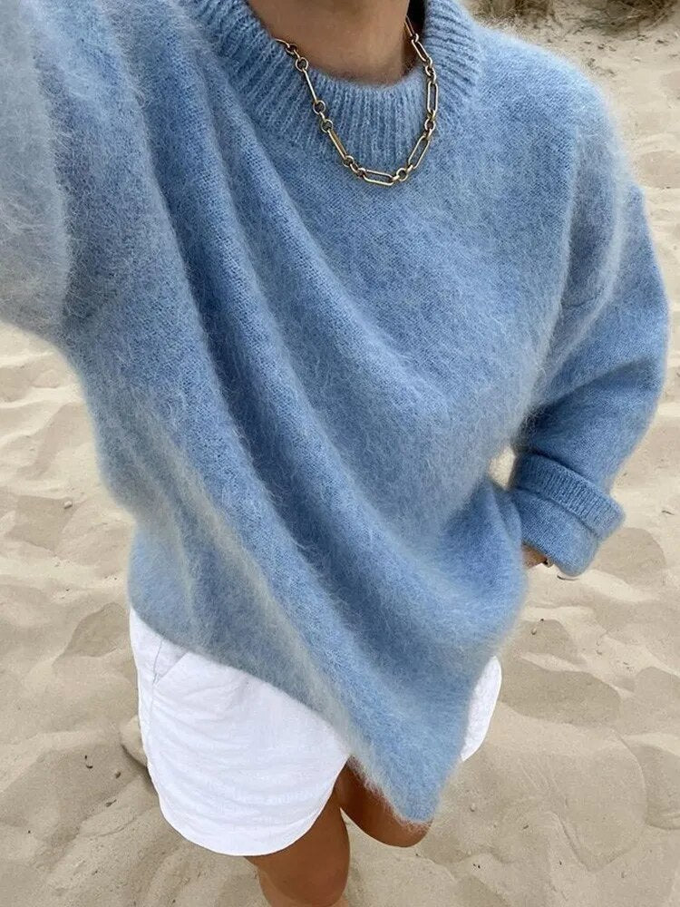 Elegancki damski sweter wełniany, idealny do noszenia na co dzień, zapewnia luksusowy komfort.