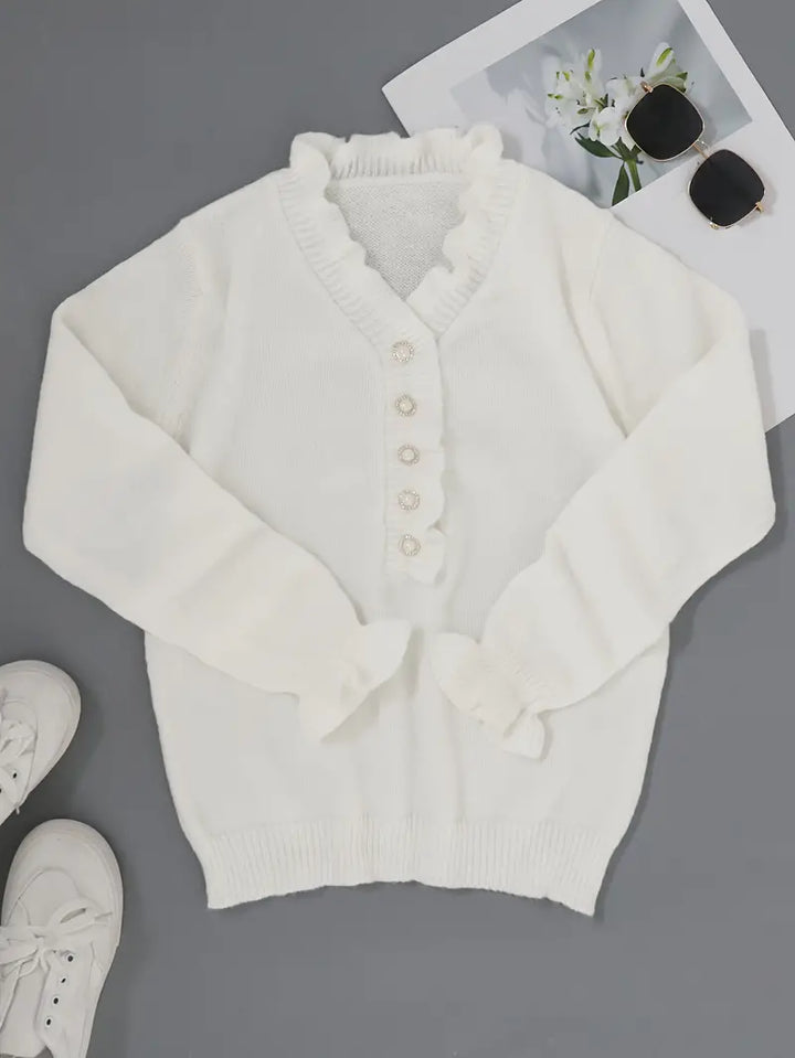 Wiosenny sweter damski z dekoltem V, bawełniany, w kolorze białym, elegancki, lekki i dopasowany, idealny do casualowych lub eleganckich stylizacji.