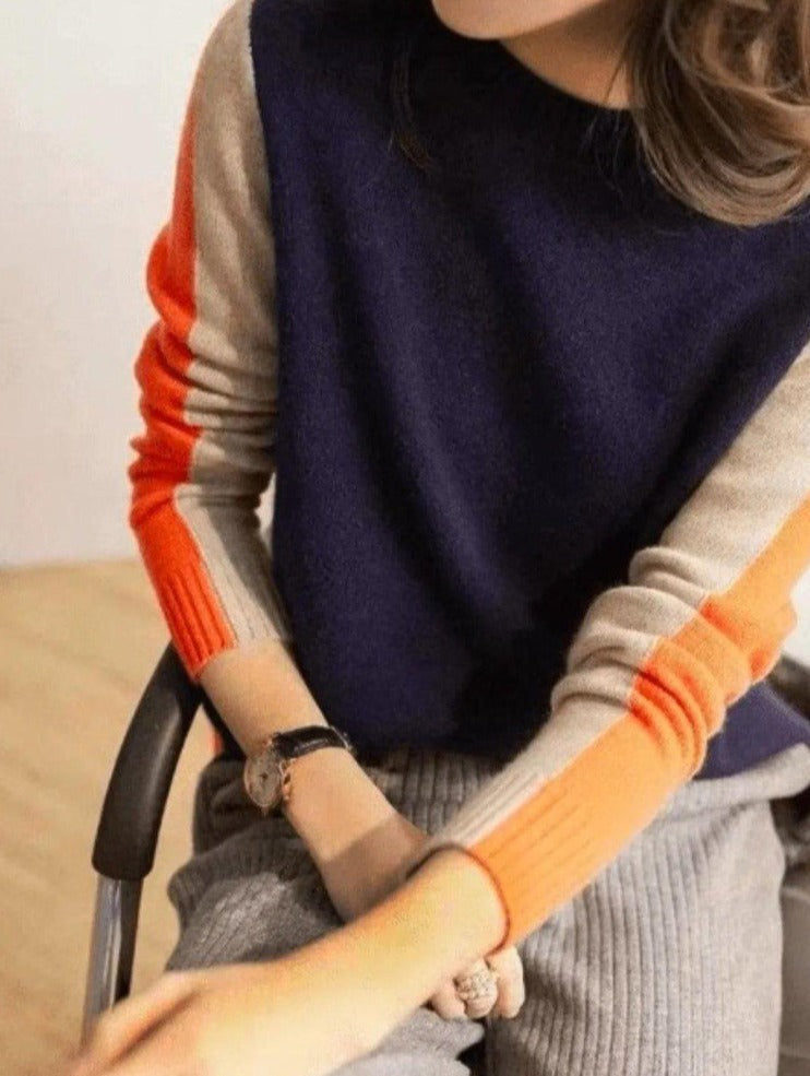 Damski sweter w granatowo-pomarańczowe paski, retro wzór color-block, miękka bawełna, klasyczny elegancki fason.