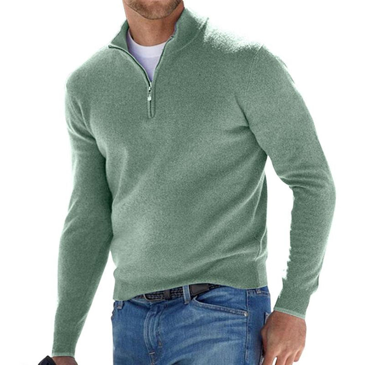 Męski sweter z ciepłej wełny, miękka tekstura, dopasowany krój, wszechstronny, elegancki, dostępny w wielu kolorach.
