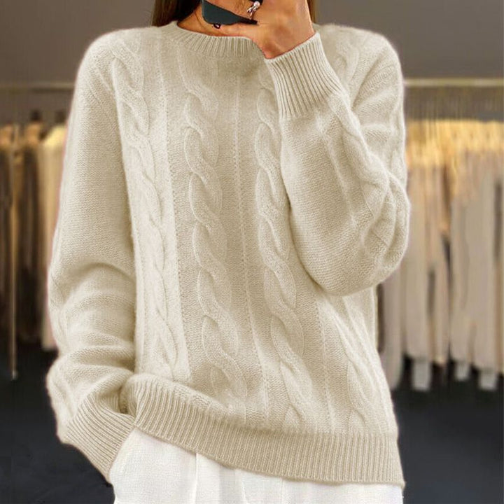 Damski sweter dziergany z miękkiej wełny, elegancki i komfortowy, z koronkowym wzorem, idealny na zimę lub wiosnę.