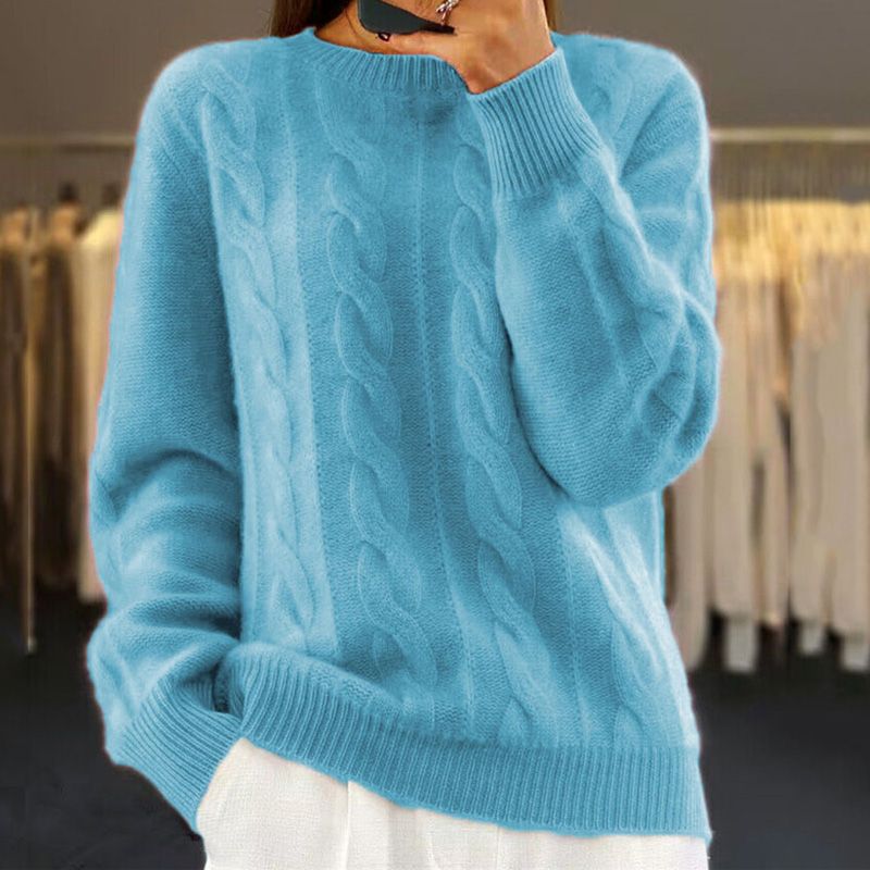Damski sweter dziergany z miękkiej wełny, elegancki i komfortowy, z koronkowym wzorem, idealny na zimę lub wiosnę.