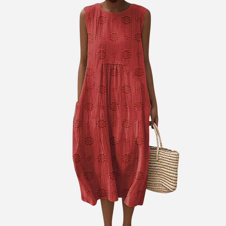 Szykowna bawełniana sukienka boho, midi, bez rękawów, o swobodnym kroju, z kieszeniami, geometrycznym wzorem, idealna na lato.