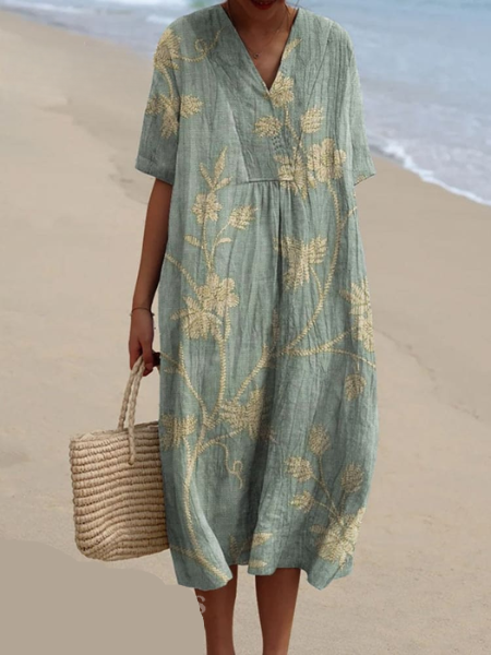 "Robe d'été Odile en coton-lin, motifs floraux, coupe élégante et confortable, idéale pour vos journées estivales."