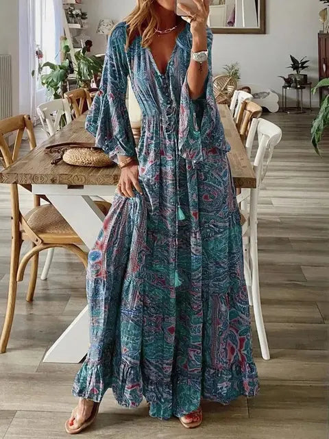 Długa sukienka boho damska, szykowna, na lato, z rozkloszowanymi rękawami, kwiatowymi wzorami, podkreślającym figurę wysokim stanem i eleganckim dekoltem w serek.
