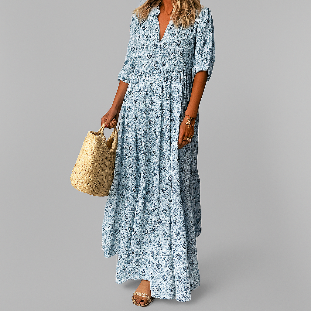Robe longue en coton avec imprimé vintage, idéale pour l'été; silhouette maxi fluide et manches 3/4 pour élégance décontracté