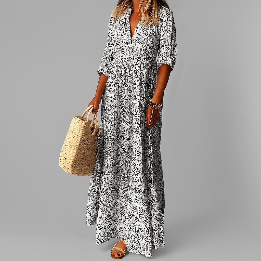 Robe longue en coton avec imprimé vintage, idéale pour l'été; silhouette maxi fluide et manches 3/4 pour élégance décontracté