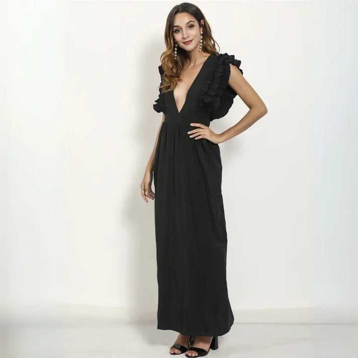 Elegancka sukienka maxi damska z falbankami i głębokim dekoltem, idealna na letnie wieczory i specjalne okazje.