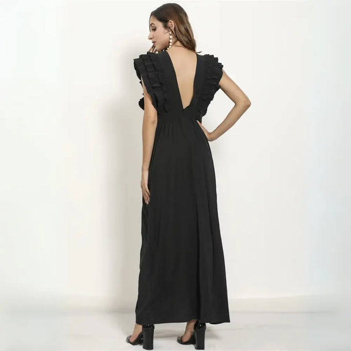 Elegancka sukienka maxi damska z falbankami i głębokim dekoltem, idealna na letnie wieczory i specjalne okazje.