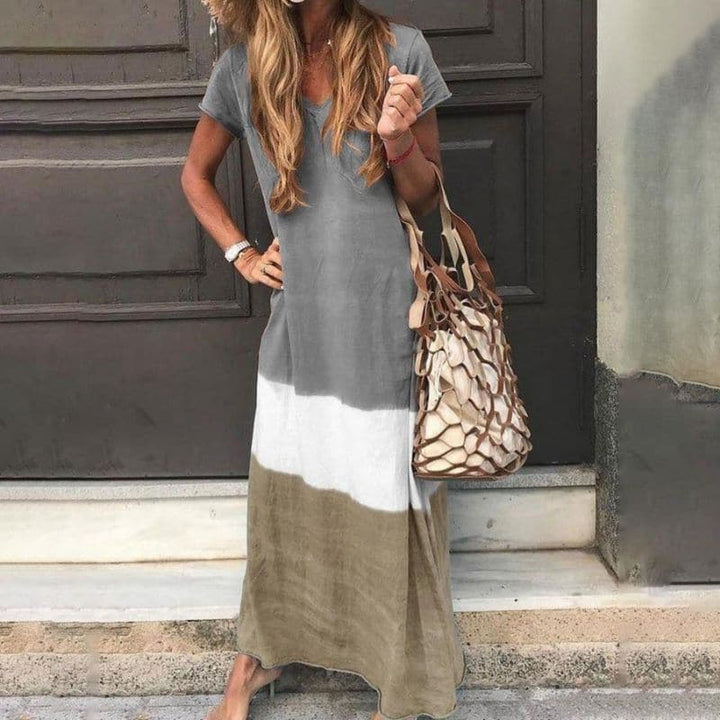 Damska sukienka maxi boho color block – połączenie kolorów inspirowane zachodem słońca.
