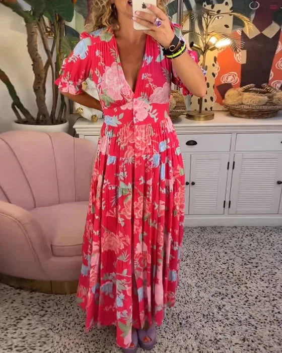 Rozkloszowana sukienka maxi z dekoltem w serek, żywym wzorem kwiatowym, bufiastymi rękawami, szykowny i elegancki styl dla kobiet