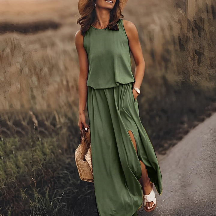 Elegancka i kolorowa sukienka maxi JONNA bez rękawów, w stylu retro, z lekkiego i zwiewnego materiału, zapewniająca wyrafinowany wygląd.