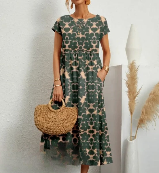 Elegancka sukienka Virginie o dopasowanym kroju, nowoczesny i ponadczasowy styl, doskonała na formalne i codzienne wyjścia.