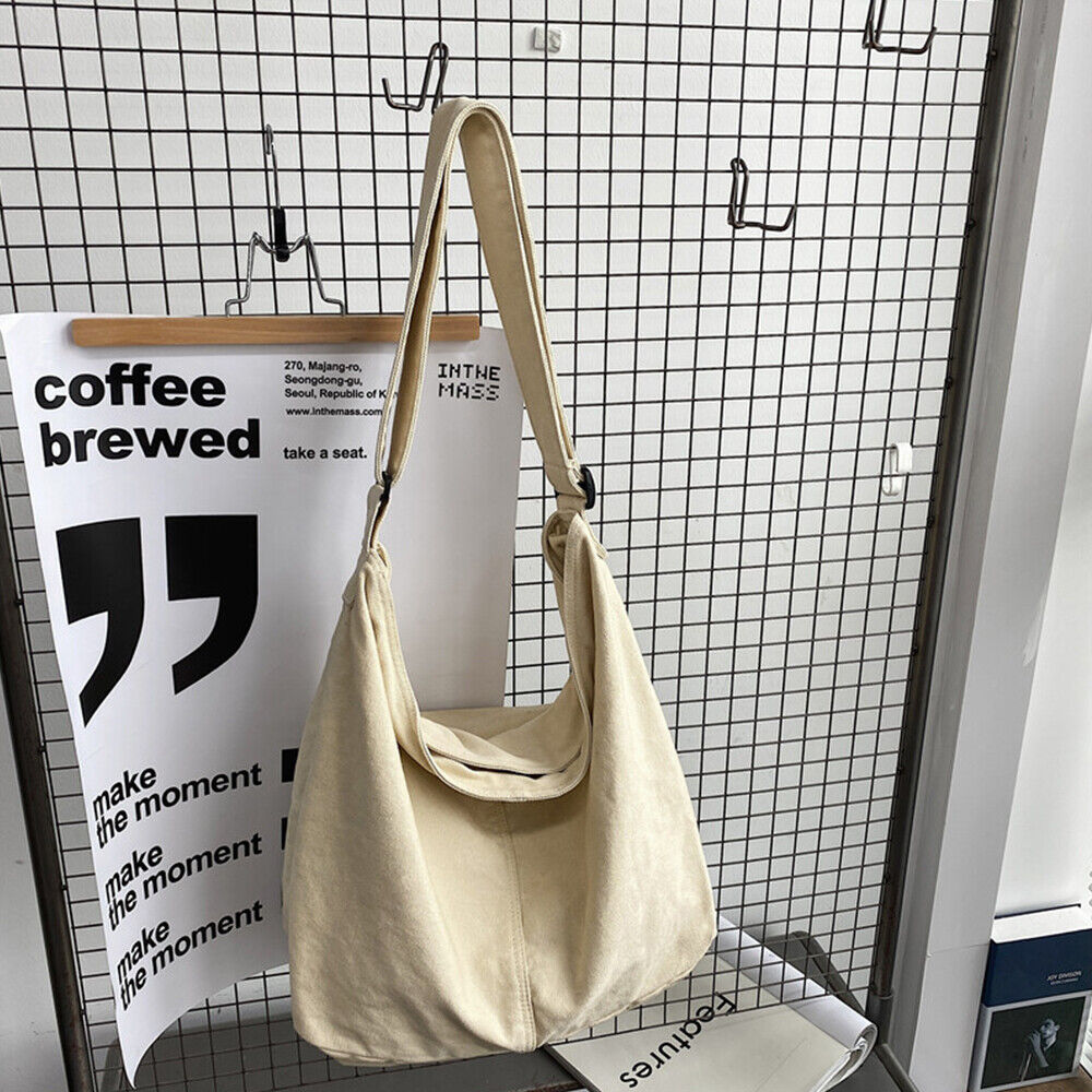 Pojemna torba na ramię z płótna, minimalistyczny design, regulowany pasek, idealna do pracy i na co dzień.
