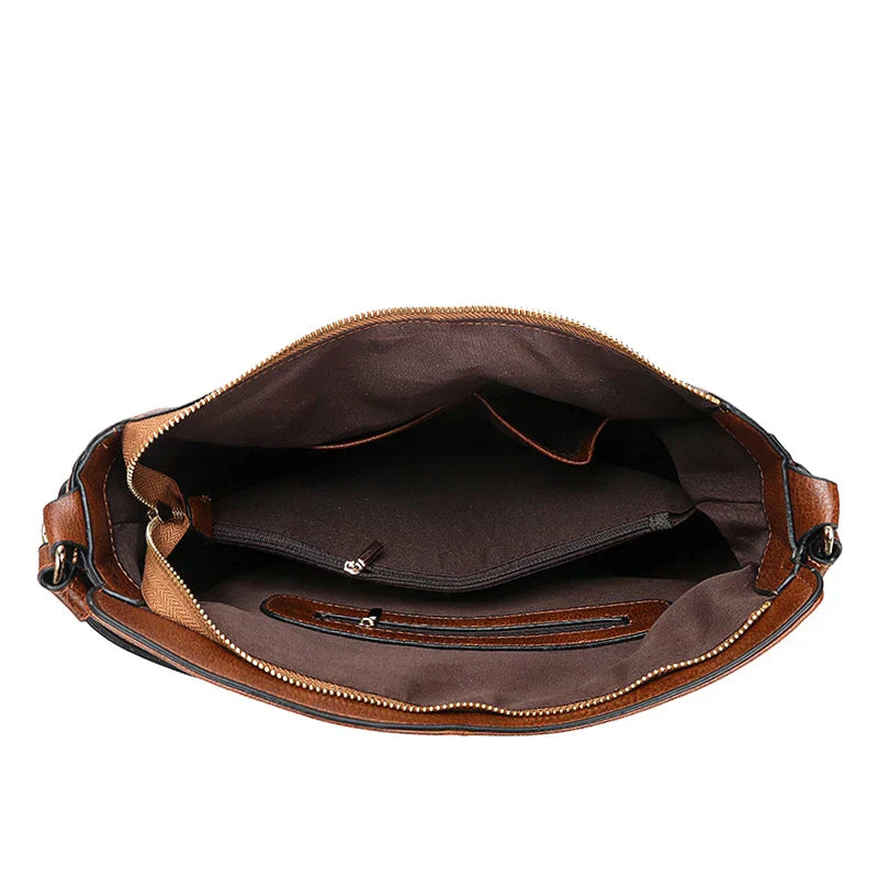 Damska torebka Hobo z miękkiego materiału, przestronna i elegancka.
