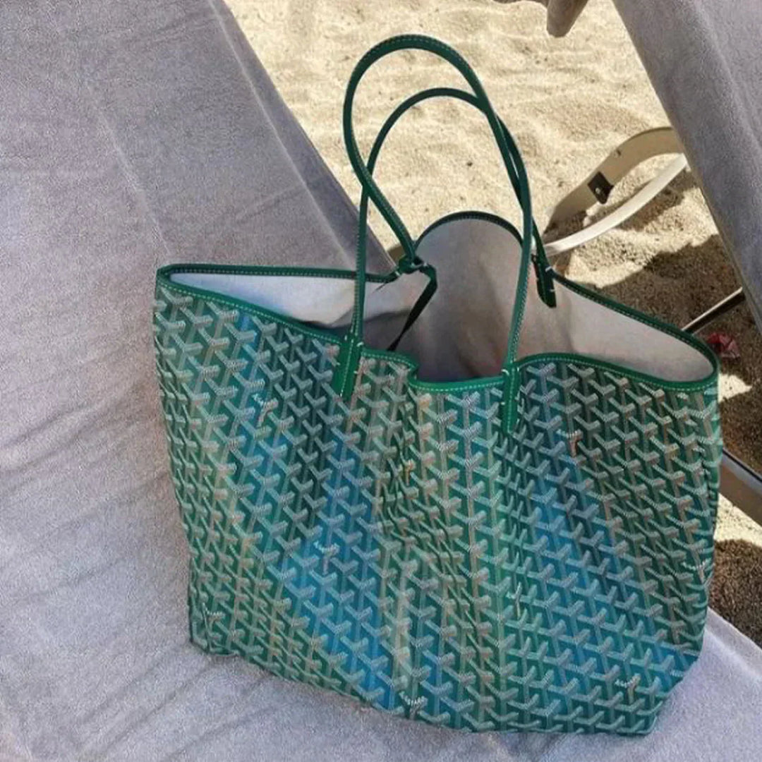 Luksusowa torebka damska shopper, elegancka i praktyczna, o smukłym designie, z wygodnymi uchwytami i wysokiej jakości wykończeniem.